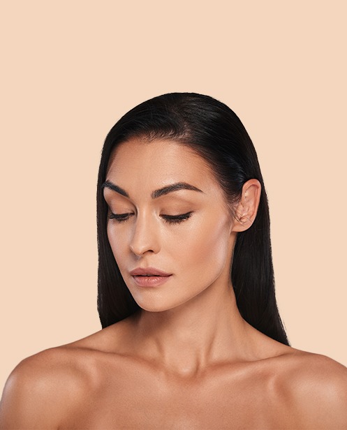 Rejuvenated upper face showing precise brow lift surgical results, Oak Brook